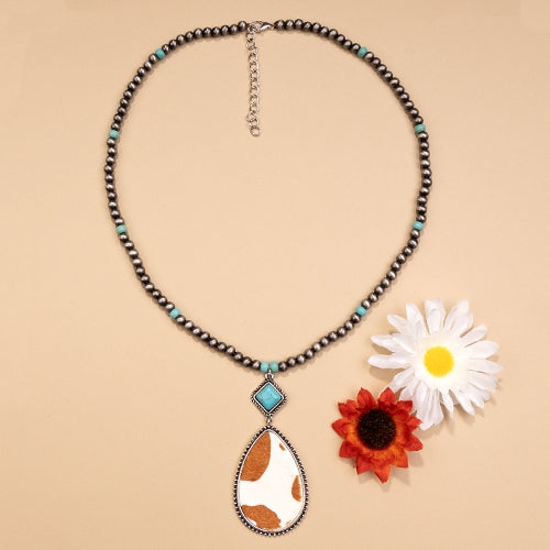 72774 - Squash Blossom Animal Hide - TQ Silver