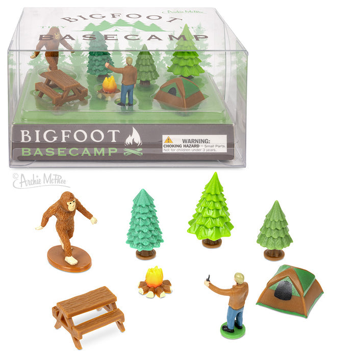 The Bigfoot Basecamp set includes soft vinyl figures such as trees, tents, and a Bigfoot figure, all enclosed in clear packaging that's ideal for displaying on a desktop.