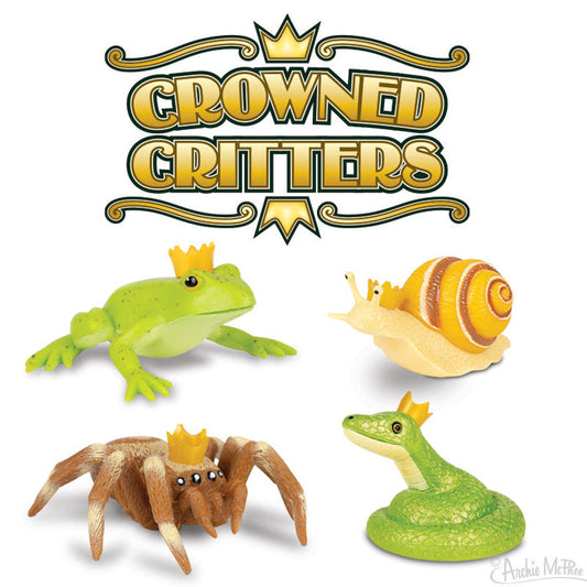 Crowned Critters presents a charming collection of forest creatures, including frogs, snails, spiders, and snakes, each adorned with elegant gold crowns. These vinyl toys blend the delightful essence of woodland critters with a touch of royal elegance.