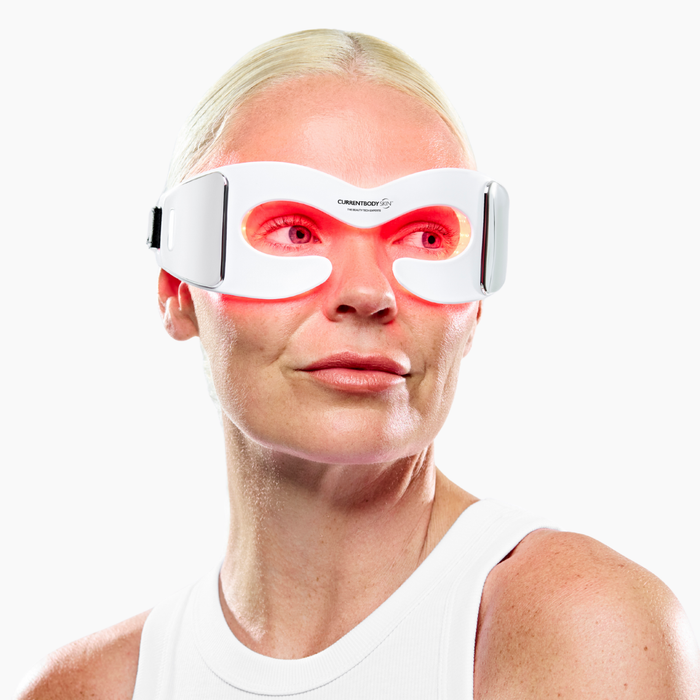 Image of woman looking to right wearing led eye mask