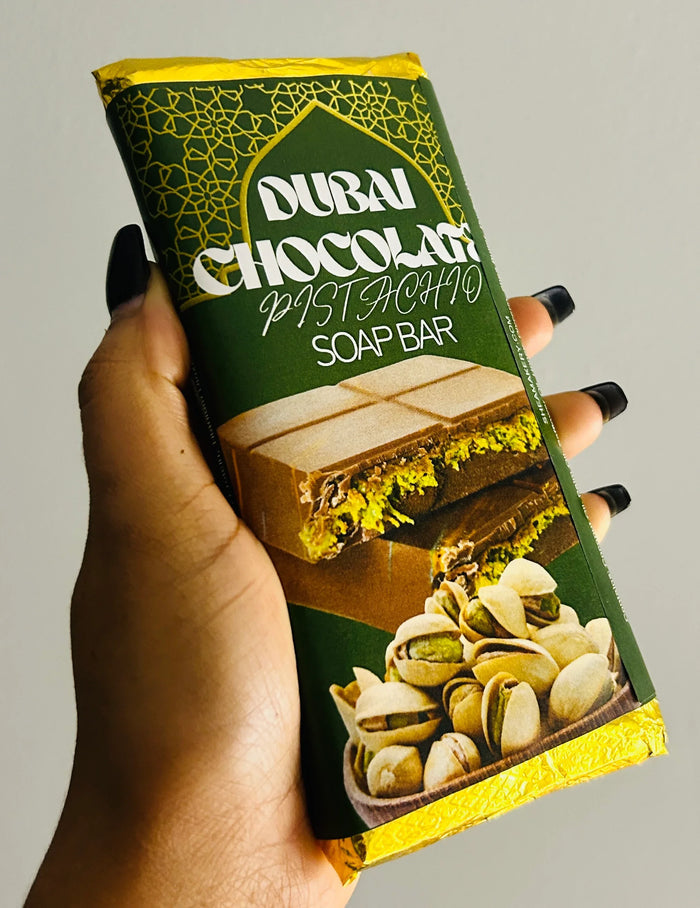 Hand holding Dubai Chocolate Pistachio soap bar with pistachio and chocolate imagery