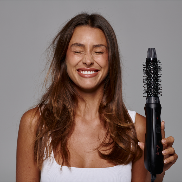 Before and after results of the Mermade Hair Interchangeable Blow Dry Brush - Sleek Black