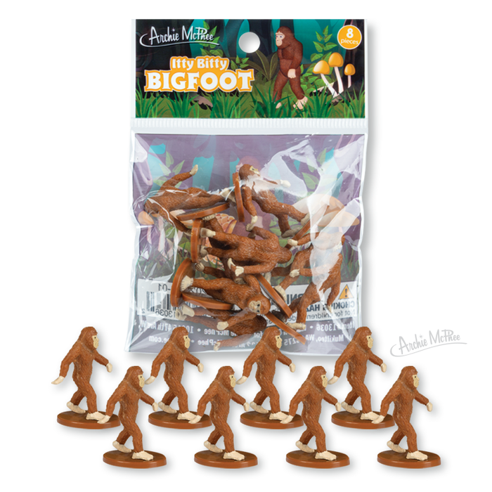 Itty Bitty Bigfoot features small soft vinyl Bigfoot figurines displayed at the front of the package.