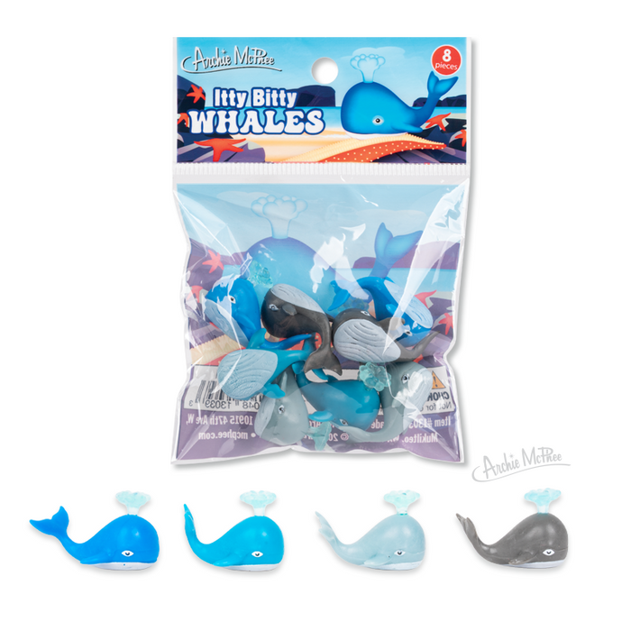 Itty Bitty Whales: a set of four colorful soft vinyl mini whale toys shown beneath an illustrated whale bag.
