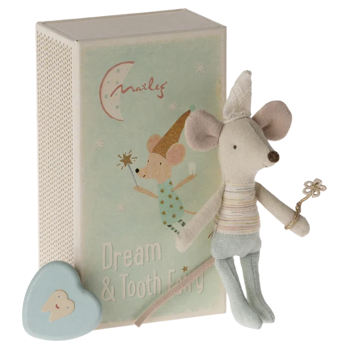A toy mouse with a grey and blue outfit, sitting next to a blue tooth box and a matchbox decorated with stars and the text 'Dream & Tooth Fairy'.