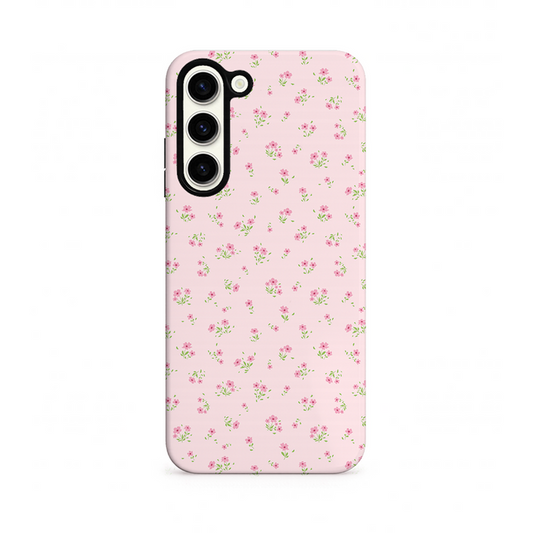 Phone case with a pink floral design on a white background