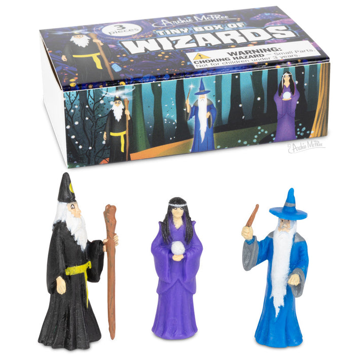 The Tiny Box of Wizards features three soft vinyl wizards in black, purple, and blue robes, reminiscent of a mystical matchbox surprise.