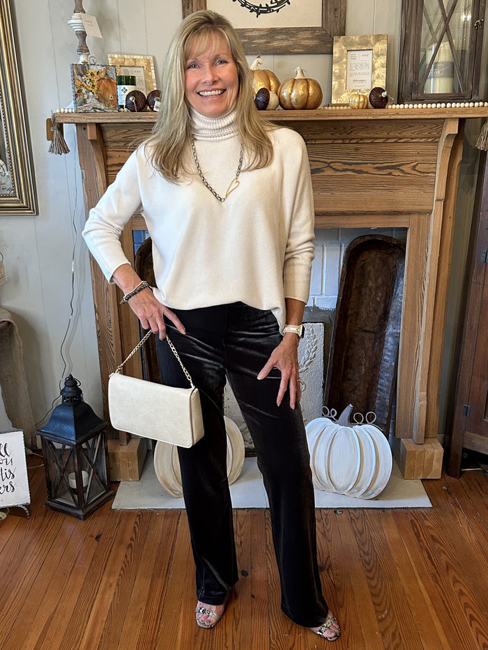 Stay comfortable and stylish in these 4-way stretch velvet pants. With a concealed waistband and wide leg, they flatter your figure while ensuring all-day comfort. Pull-on styling makes them a breeze to get on and off. Indulge in the luxury of velvet and look great while doing it!  Stretch Velvet- 92% Polyester 8% Spandex Lyssé Fit 360°Smoothing Concealed signature waistband 4-way stretch Skims hips, falls into a wide leg 31.5" Inseam Care Instructions: Machine wash cold, dry flat, cool iron