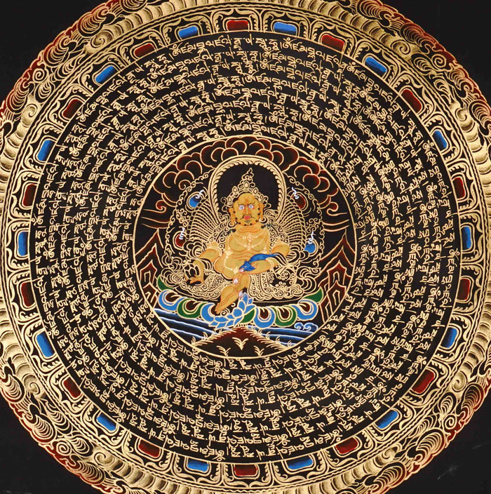 Zambhala Mandala Thangka painting with central prosperity deity, sacred Tibetan script, and traditional Himalayan Buddhist symbolism.